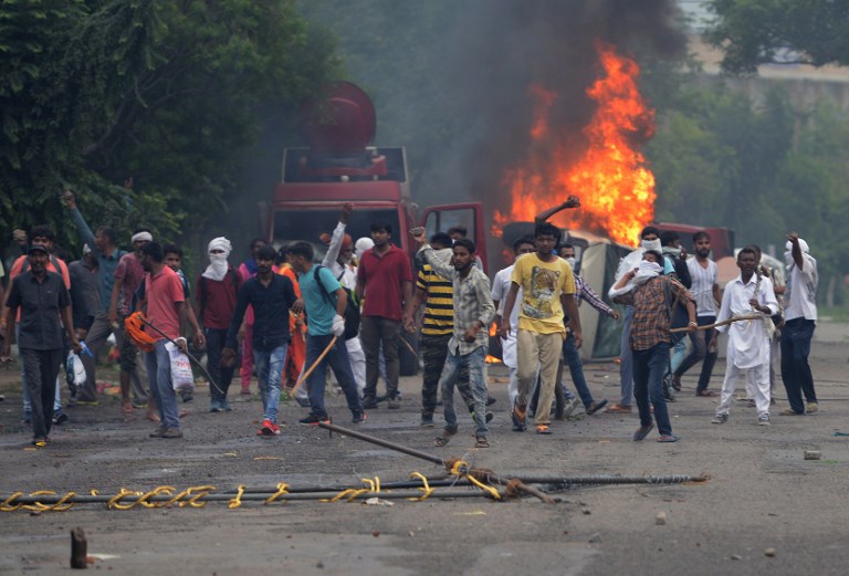 Több tucat ember halt meg az indiai zavargásokban, melyek egy guru elítélése után robbantak ki